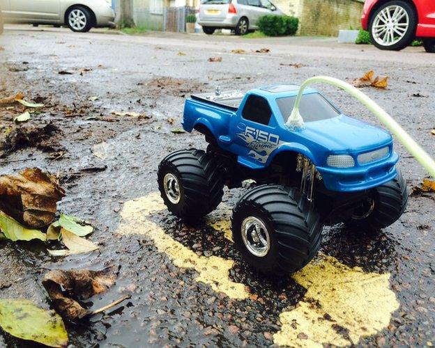 Toy truck on yellow lines