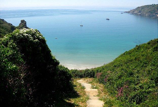 Steps down to Guernsey's Petit Port Bay