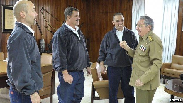 President Raul Castro with three released convicted spies