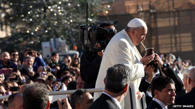 Pope Francis sips mate, an Argentinian drink (17 Dec)