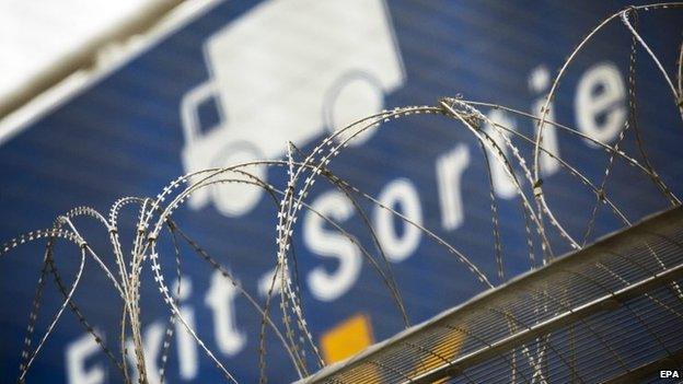 A new fence built to separate the freight zone from the main road in order to discourage migrants to access the border in Calais