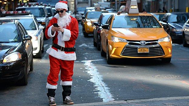 Santa Claus with smartphone