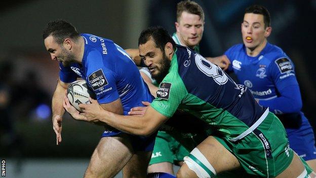 Leinster wing dave Kearney is tackled by Connacht's George Naoupu