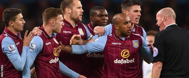 Aston Villa's players protest