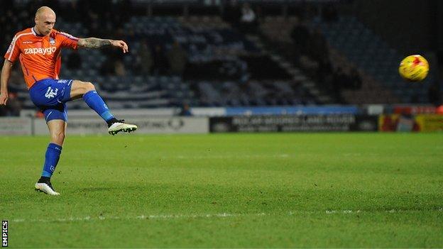 David Cotterill (left) scores the winner against Huddersfield