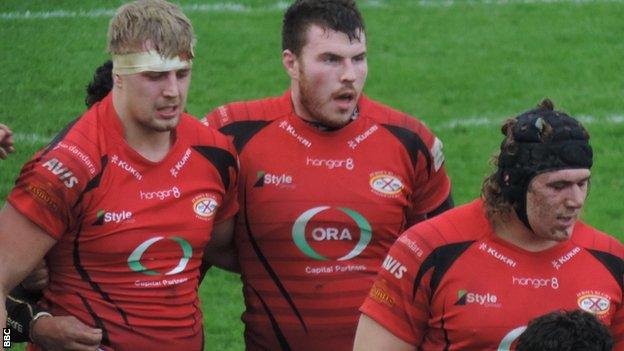 Jersey prepare for the scrum against Carnegie