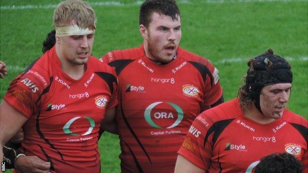 Jersey prepare for the scrum against Carnegie