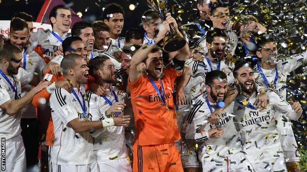 Real Madrid players celebrate winning the Club World Cup against San Lorenzo