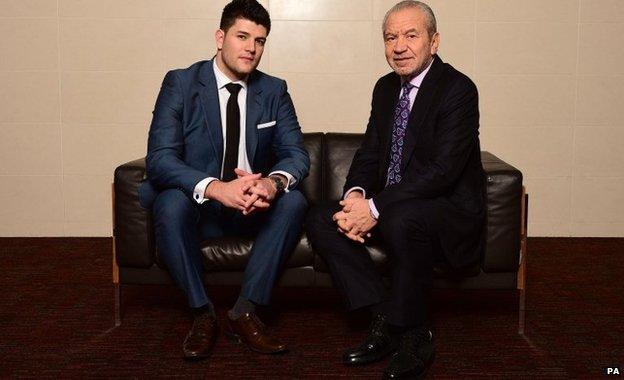 The winner of the latest series of the BBC programme The Apprentice Mark Wright, 25, celebrates with Lord Sugar in London