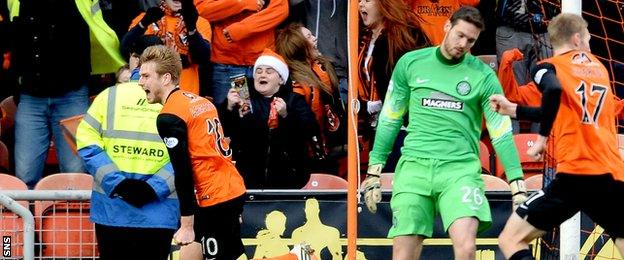 Stuart Armstrong (left) celebrates after scoring for Dundee United against Celtic