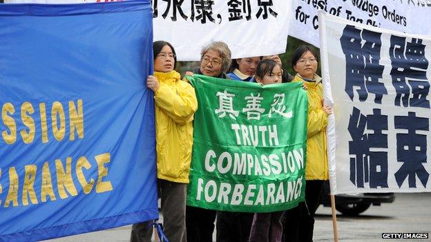 Supporters of the Falun Gong spiritual movement protest outside the Confucius Institute at Melbourne University, Australia, June 2010