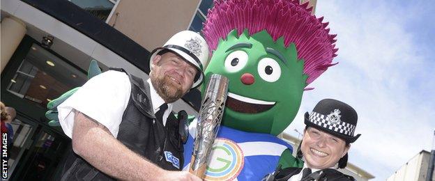 The Commonwealth Games mascot with two police officers