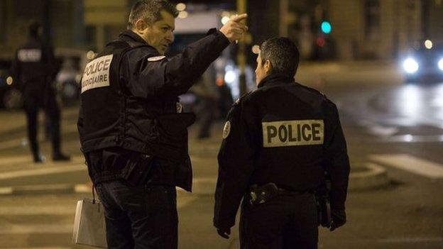 Police at the site where a driver targeted pedestrians in Dijon