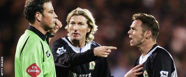 Blackburn duo Robbie Savage and Paul Dickov , and referee Mark Clattenburg