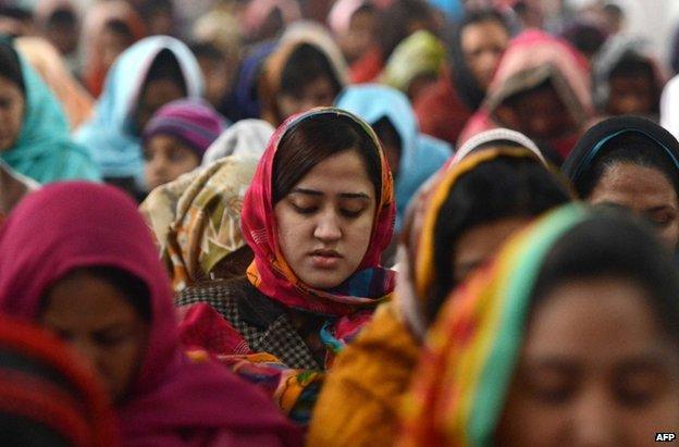 Pakistani Christians praying for the victims of the school attack in Peshawar, 21 December