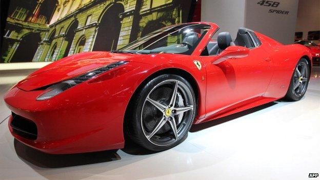 A new Ferrari 458 Spider car is on display at the international motor show IAA (Internationale Automobil-Ausstellung) in Frankfurt/M, western Germany, on September 14, 2011