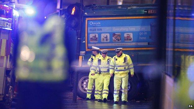 Police near the bin lorry