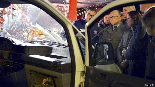 French Interior Minister Bernard Cazeneuve, centre, in Nantes. 22 Dec 2014