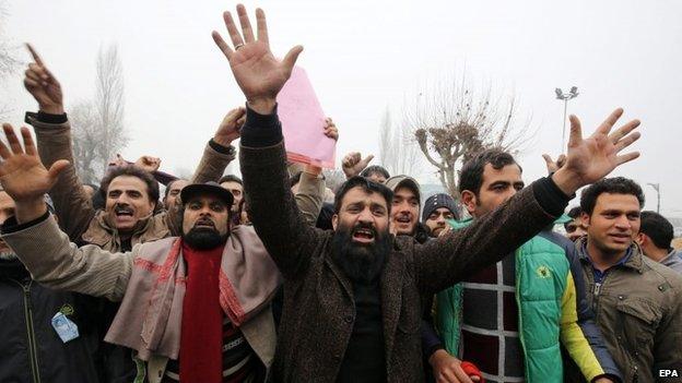 Supporters of People's Democratic Party (PDP) shout pro-party slogans after their candidates were declared winners of five out of eight seats in Srinagar