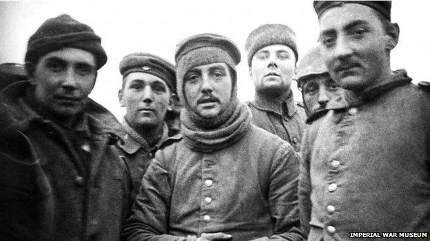 British and German troops fraternising on Christmas Day one hundred years ago during a truce in fighting