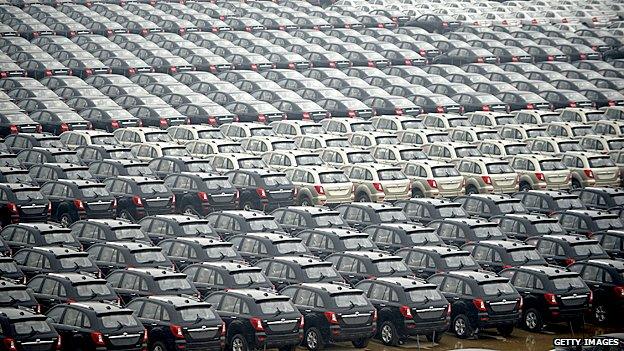 New cars lined up in rows