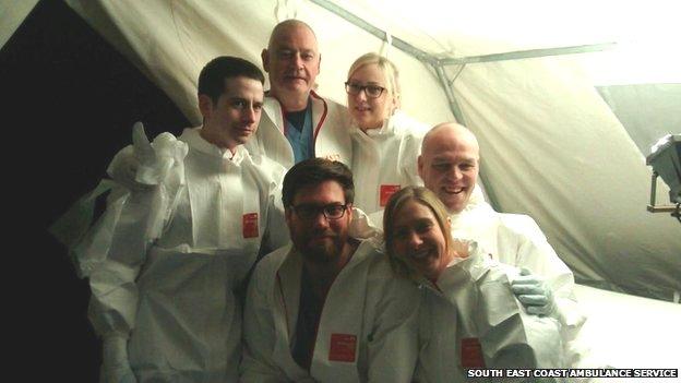 Chris Williams (top centre) in an Ebola training session with colleagues