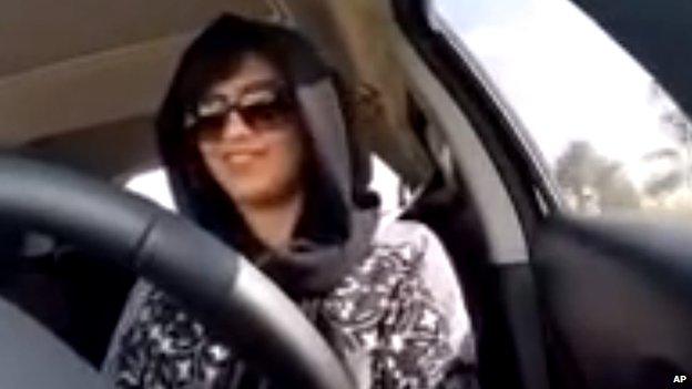 Loujain al-Hathloul at wheel of her car