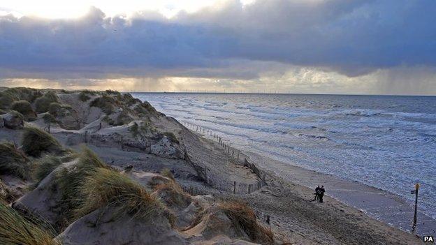 People going for a Christmas Day walk along Formby Point, Merseyside