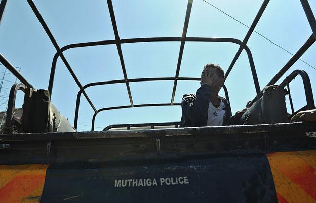 A Somali man in Eastleigh is taken away for questioning in April 2014