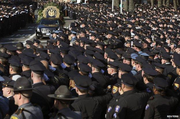 Police salute the hearse in New York, 27 December