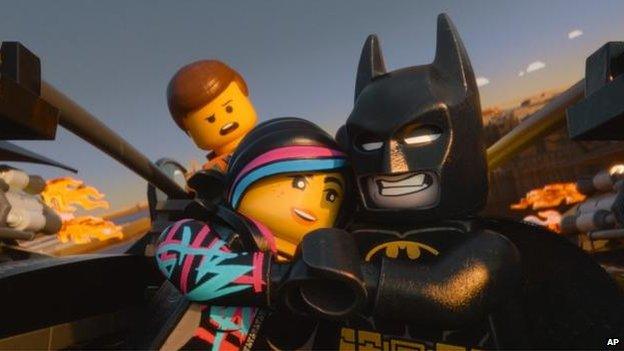 from left, Emmet, voiced by Chris Pratt, Wyldstyle, voiced by Elizabeth Banks and Batman, voiced by Will Arnett