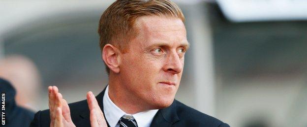 Garry Monk manager of Swansea City looks on prior to the Barclays Premier League match between Swansea City and Crystal Palace at Liberty Stadium on November 29, 2014.