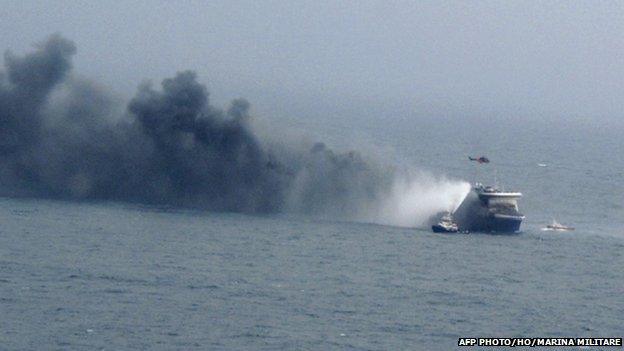 A photo grab taken from a video made available by the Marina Militare Italiana on 28 December 2014, shows the burning ferry "Norman Atlantic" adrift off Albania.