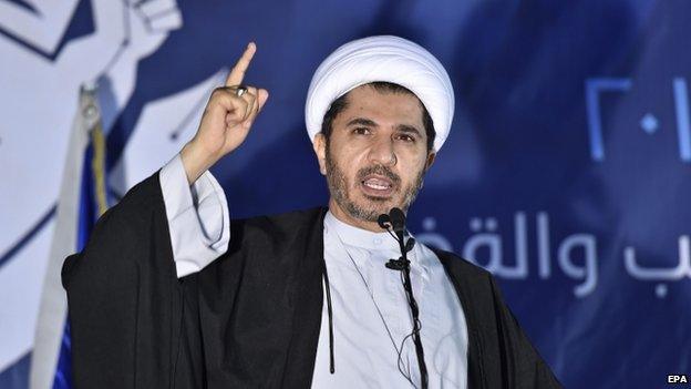 Sheikh Ali Salman (L), secretary general of the leading opposition grouping Al-Wefaq, speaks during Al-Wefaq general assembly meeting in Karanah village north of the Bahraini capital Manama, 26 December 2014