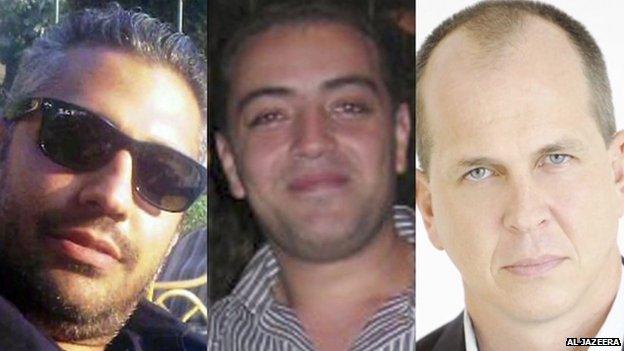 Image shows Al Jazeera journalists Mohamed Fahmy, Baher Mohamed and Peter Greste. On 29th December 2013
