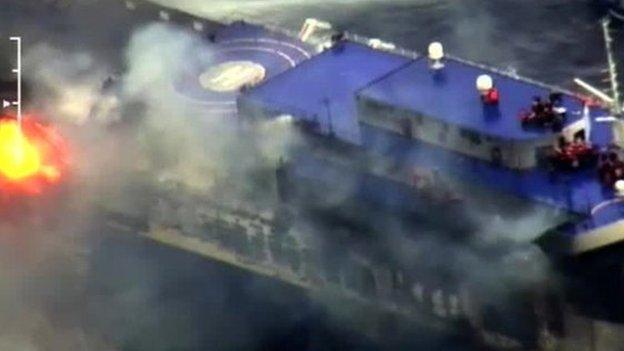 Footage released by the Italian coast guard showed the ferry shrouded in smoke