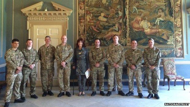 June Davey with soldiers at Clandon Park