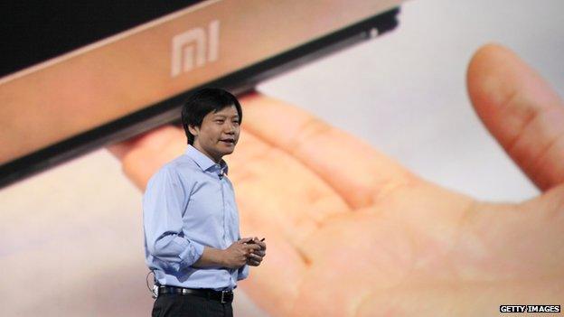 Xiaomi CEO Lei Jun speaks during a product launch