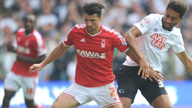 Nottingham Forest's Eric Lichaj (left) and Derby County's Ryan Shotton tussle for possession