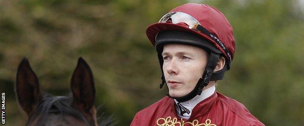 Jamie Spencer poses at Lingfield racecourse on December 17, 2014 in Lingfield, England.