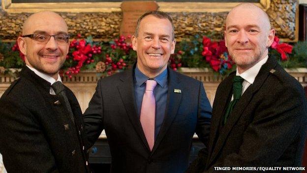 Joe Schofield (left) and partner Malcolm Brown (right) pose for a photograph ahead of their marriage, along with Ross Wright from the Humanist Society Scotland.