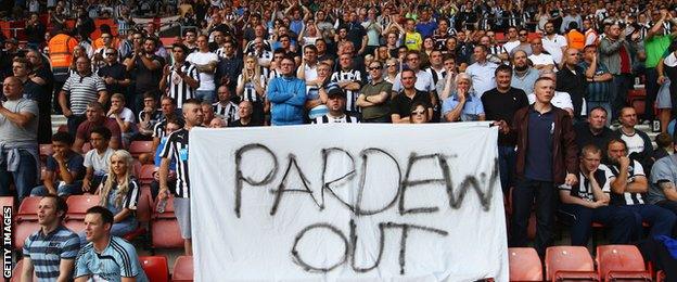 Newcastle United fans hold a 'Pardew Out' banner during the Barclays Premier League match between Southampton and Newcastle United at St Mary's