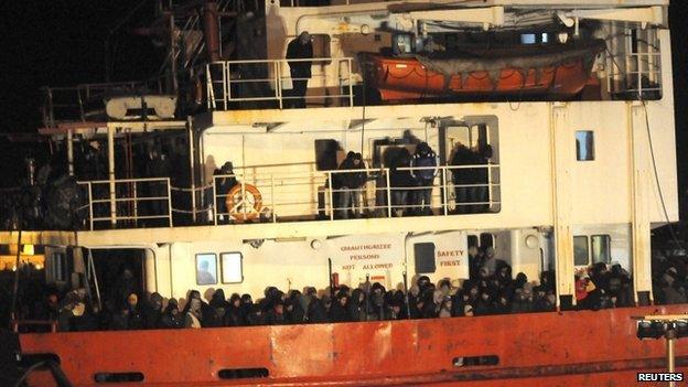 The Blue Sky M cargo ship, carrying an estimated 900 migrants, is seen at the Gallipoli harbour, southern Italy, on 31 December 2014.