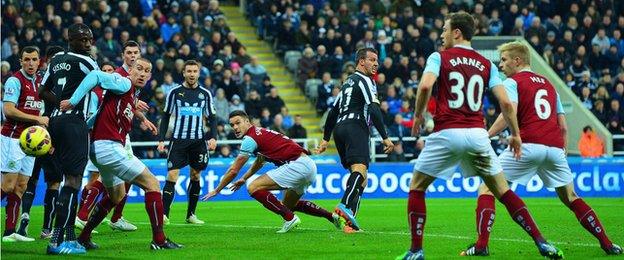 Steven Taylor scores Newcastle's opening goal against Burnley