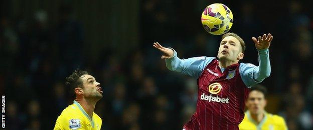 Andreas Weimann (right) heads the ball under pressure from Damien Delaney