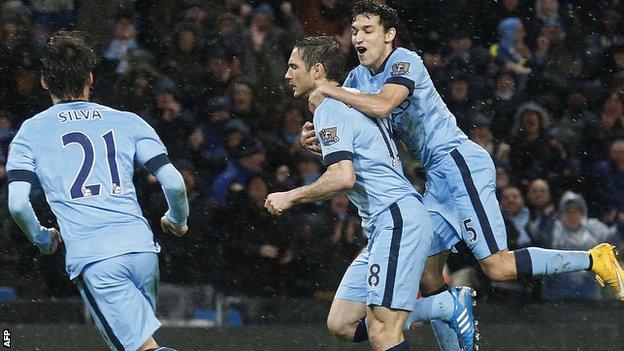 Frank Lampard is congratulated by his Manchester City team-mates after scoring the winner against Sunderland