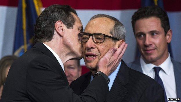 Democratic Governor Andrew Cuomo embraces his father Mario (right) after being re-elected at the US midterm race in New York (November 2014)