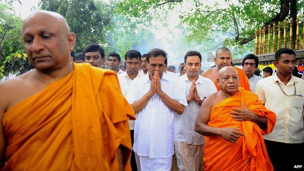 Maithripala Sirisena visits a Buddhist temple