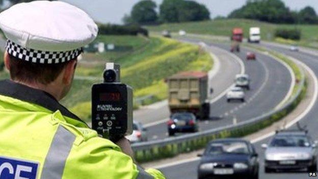 A policeman monitoring traffic