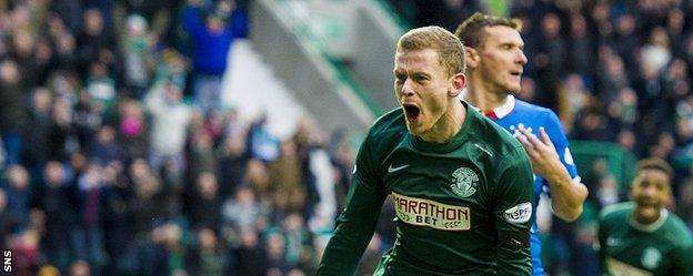 Scott Robertson celebrates as he scores Hibs' third against Rangers